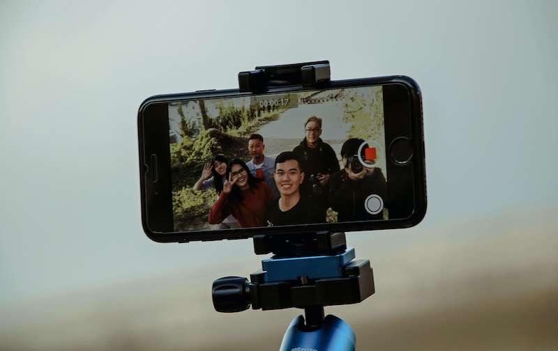 a smartphone with a camera attached to it
