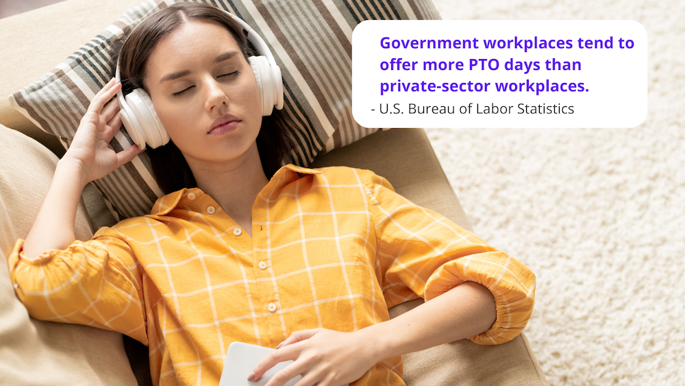 a government worker listening to music through over the ear headphones during her time off. Government workplaces tend to offer more PTO days than private-sector workplaces according to the U.S. Bureau of Labor Statistics