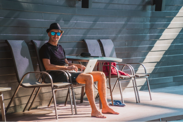 A remote worker, productivity by the pool