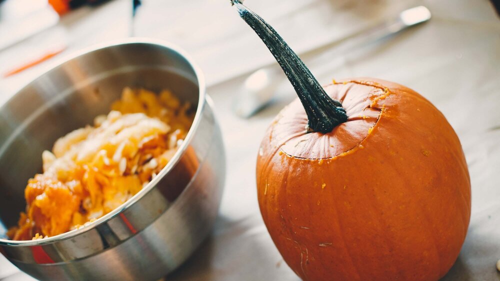 Each of your team members carves a pumpkin.