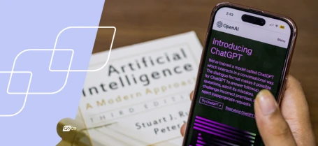 an hr professional using a cell phone to access chatgpt while reading a book about artificial intelligence