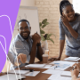 A group of people working around a conference table