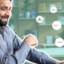 a man exploring HR software solutions at his laptop
