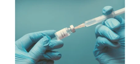 the covid-19 vaccine being drawn into a needle