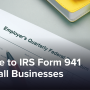 A paper copy of IRS Form 941 on a desk.