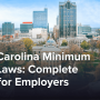 The North Carolina state capitol building with the skyline fo Raleigh, North Carolina in the background.