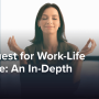 A woman meditating at her desk.
