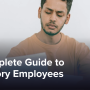 Man looking through documents at workplace.