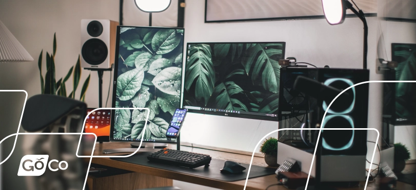 A home office setup with dual monitors and zoom call lighting